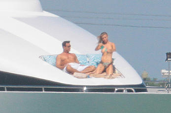 Joanna Krupa goes topless on a yacht in Miami