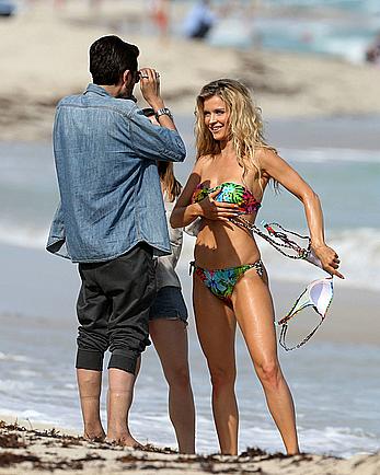 Joanna Krupa sexy in bikini on a beach