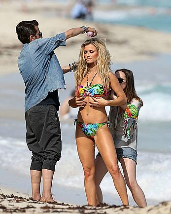 Joanna Krupa sexy in bikini on a beach