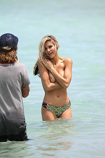 Joy Corrigan topless during bikini photoshoot in Miami