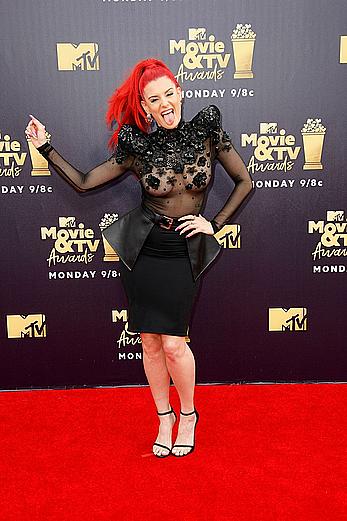 Justina Valentine posing braless in see through dress at the MTV Movie & TV Awards