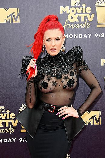 Justina Valentine posing braless in see through dress at the MTV Movie & TV Awards