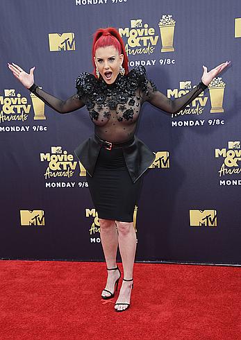 Justina Valentine posing braless in see through dress at the MTV Movie & TV Awards