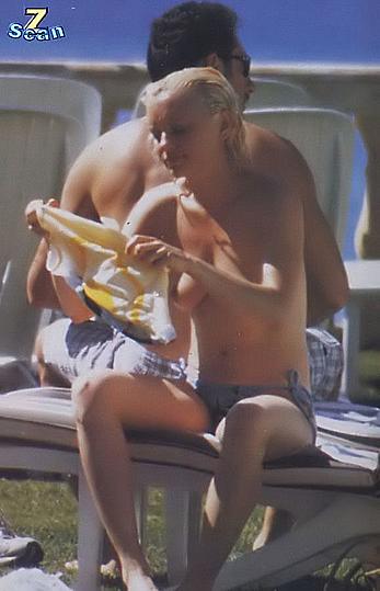 Justine Mattera sunbathing topless