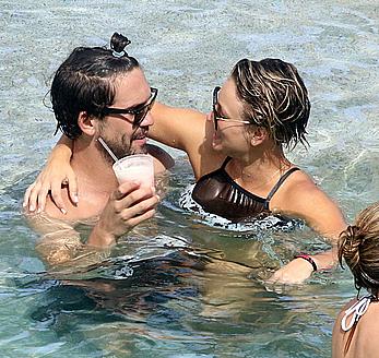 Kaley Cuoco wearing a bikini at a pool in Mexico