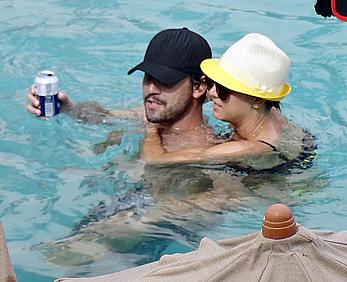 Kaley Cuoco wearing a bikini at a pool in Mexico