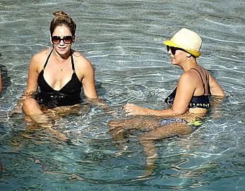 Kaley Cuoco wearing a bikini at a pool in Mexico