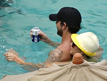 Kaley Cuoco wearing a bikini at a pool in Mexico