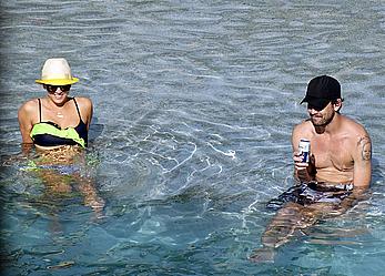 Kaley Cuoco wearing a bikini at a pool in Mexico