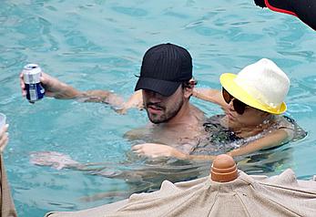 Kaley Cuoco wearing a bikini at a pool in Mexico