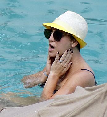 Kaley Cuoco wearing a bikini at a pool in Mexico