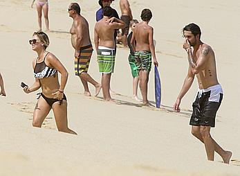 Kaley Cuoco wearing a bikini at a pool in Mexico