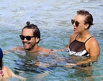 Kaley Cuoco wearing a bikini at a pool in Mexico