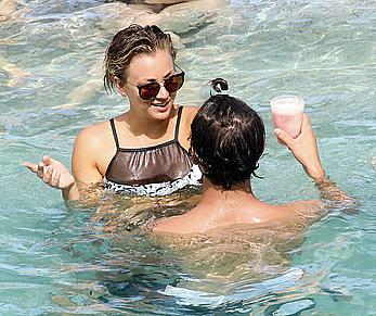 Kaley Cuoco wearing a bikini at a pool in Mexico