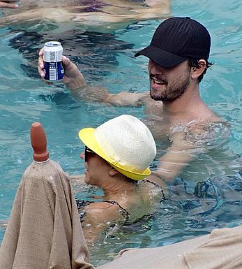 Kaley Cuoco wearing a bikini at a pool in Mexico