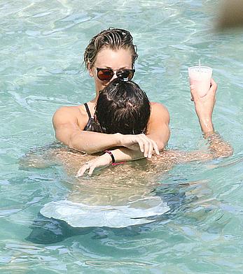 Kaley Cuoco wearing a bikini at a pool in Mexico