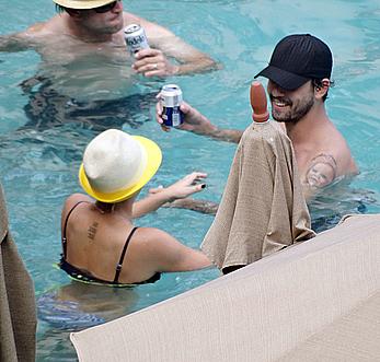 Kaley Cuoco wearing a bikini at a pool in Mexico