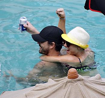 Kaley Cuoco wearing a bikini at a pool in Mexico