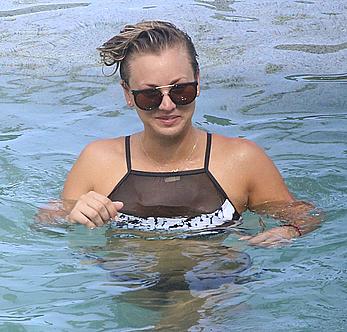 Kaley Cuoco wearing a bikini at a pool in Mexico