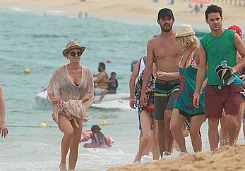 Kaley Cuoco wearing a bikini at a pool in Mexico