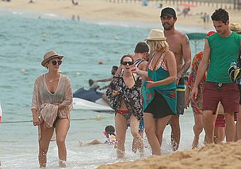 Kaley Cuoco wearing a bikini at a pool in Mexico