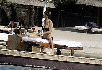 Karen Mulder relaxing topless in Mauritus near the beach