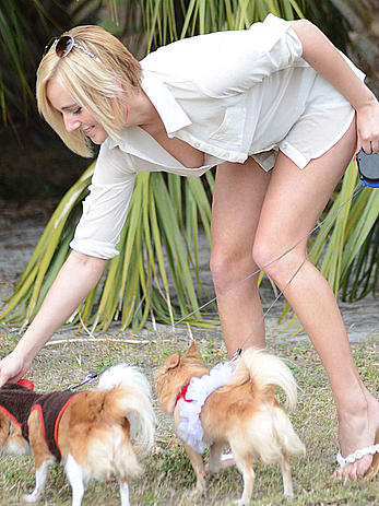 Kate England areola slip when walking her dogs in Miami