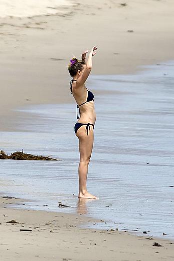 Kate Hudson wearing a bikini at a beach in Malibu