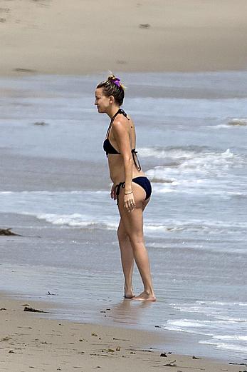 Kate Hudson wearing a bikini at a beach in Malibu