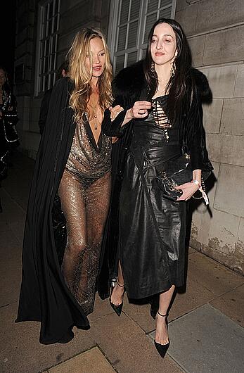 Kate Moss boob slip at Lets it all hang out partying in London