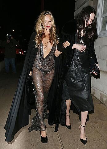 Kate Moss boob slip at Lets it all hang out partying in London