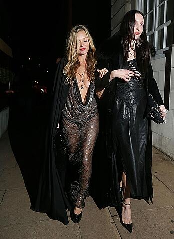 Kate Moss boob slip at Lets it all hang out partying in London