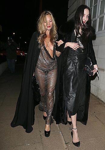 Kate Moss boob slip at Lets it all hang out partying in London