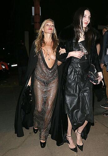 Kate Moss boob slip at Lets it all hang out partying in London