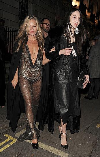 Kate Moss boob slip at Lets it all hang out partying in London