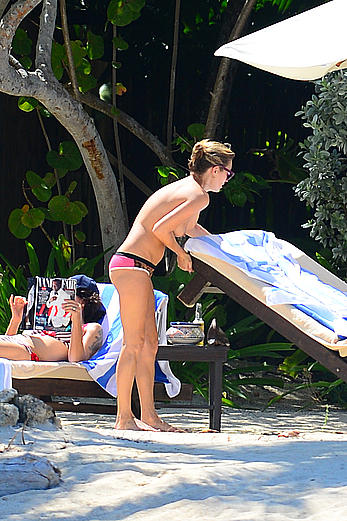 Supermodel Kate Moss caught topless on a beach in Jamaica