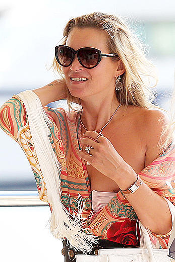 Kate Moss nipslip while boarding a yacht