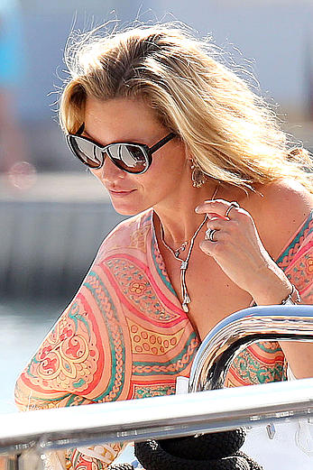 Kate Moss nipslip while boarding a yacht