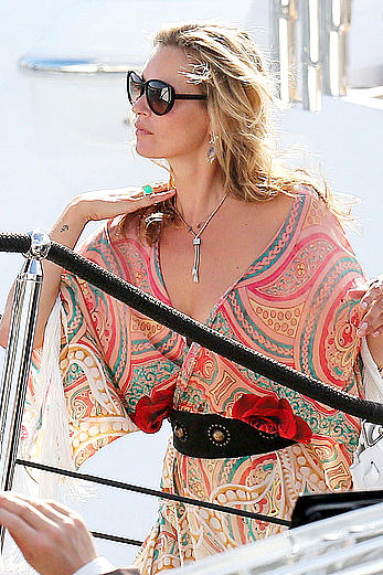 Kate Moss nipslip while boarding a yacht