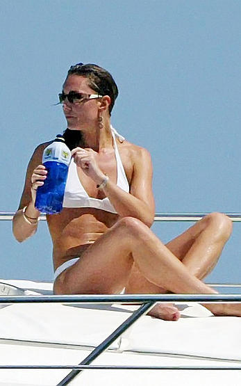 Kate Middleton in white bikini on a boat