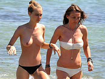 Katharina Damm swimming topless in St. Tropez