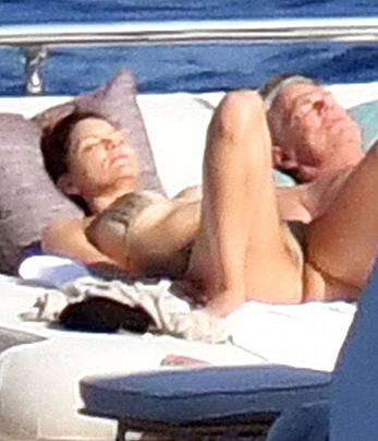 Katharine McPhee sunbathing topless on a yacht in Capri