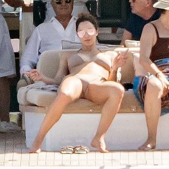 Katharine McPhee sunbathing topless on a yacht in Capri