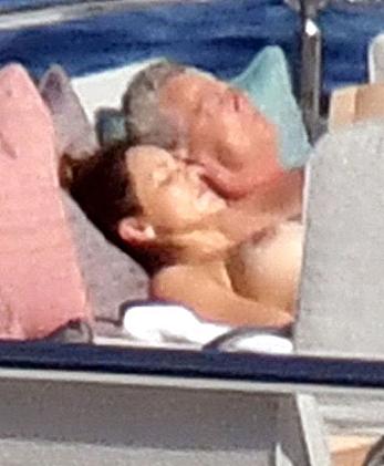 Katharine McPhee sunbathing topless on a yacht in Capri