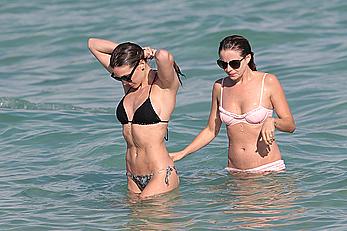 Katie Cassidy in bikini on the beach with friends