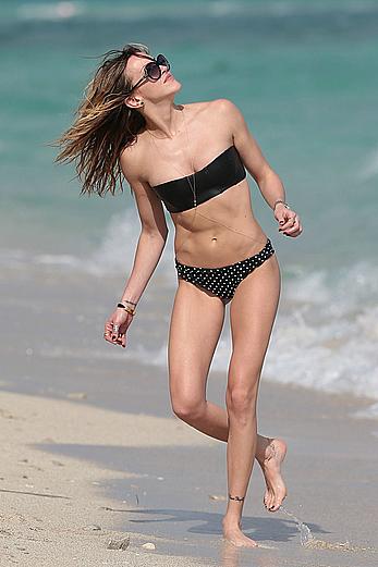 Katie Cassidy wearing black bikini in Miami