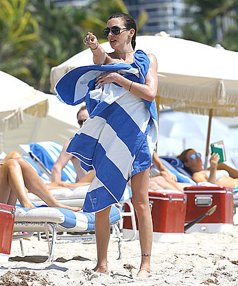 Katie Cassidy in red bikini on the beach candids