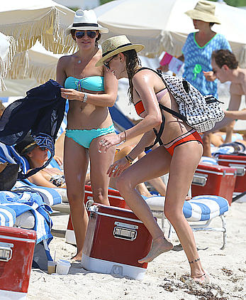 Katie Cassidy in red bikini on the beach candids