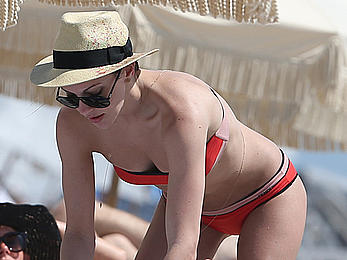 Katie Cassidy in red bikini on the beach candids