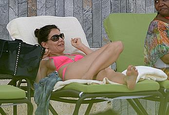 Katie Holmes in pink bikini at a pool in Miami